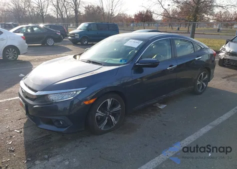 2018 Honda Civic Touring z USA, uszkodzony, nr VIN JHMFC1F94JX030428
